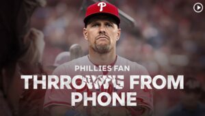 phillies fan throws phone
